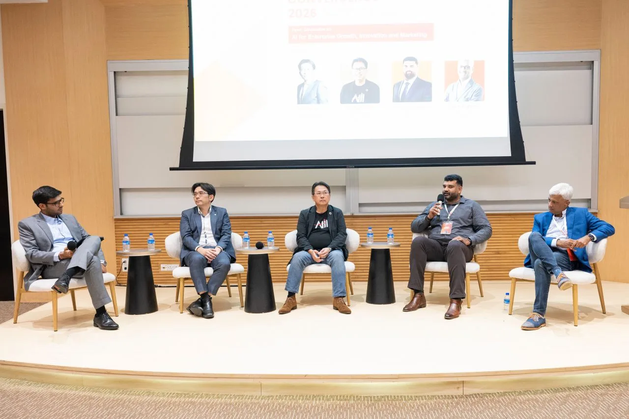 Ahmed Muzammil on stage with fellow panellists at Jio Institute Convergence 2026